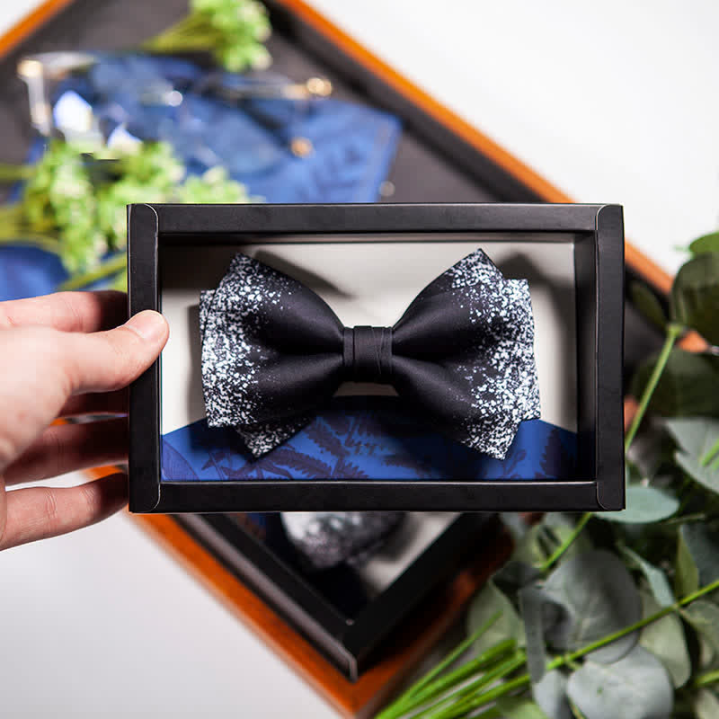 Pajarita para hombre con diseño de cielo nocturno resplandeciente en blanco y negro