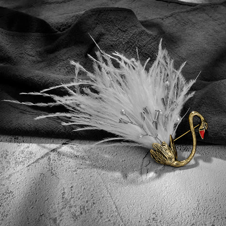 Broche de plumas de cisne de peluche blanco y negro para mujer