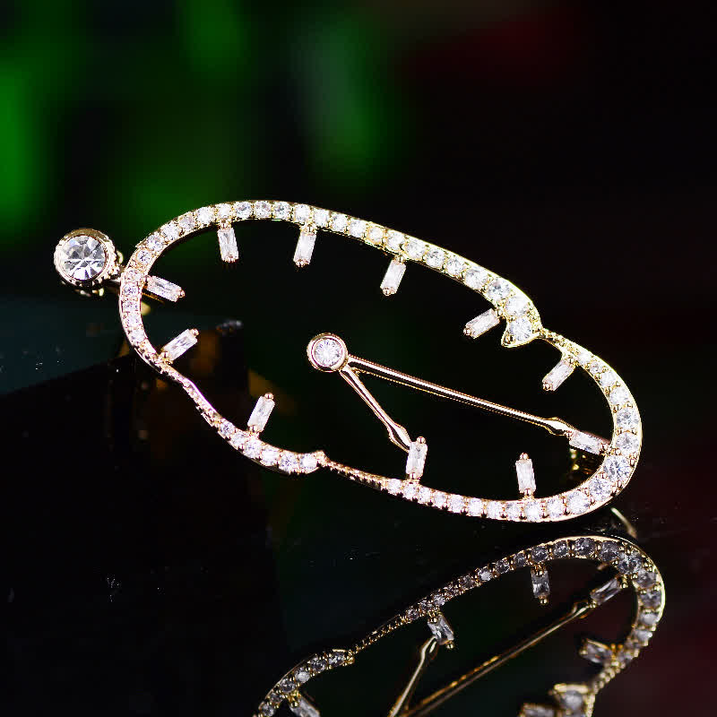 Broche unisex con reloj abstracto con hora invertida