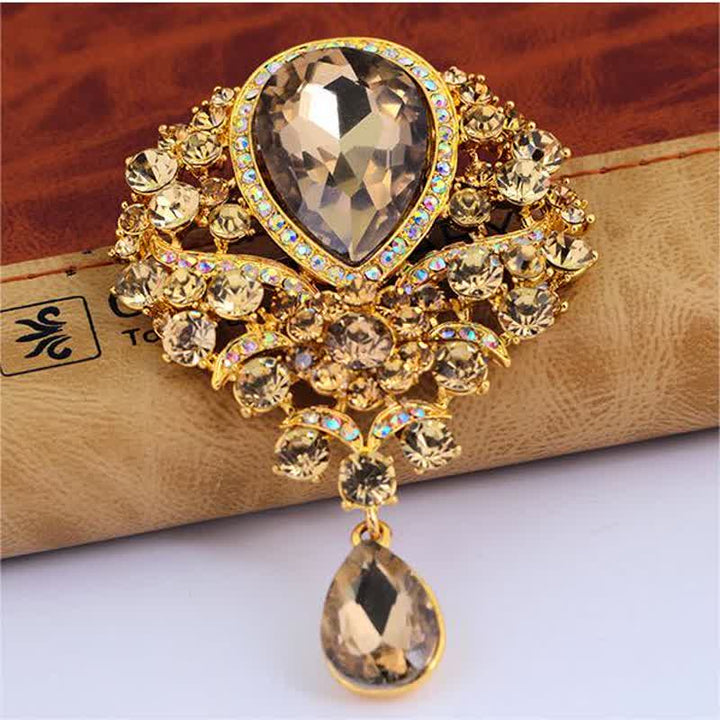 Broche de cristal transparente con forma de flor y gota de agua para mujer.