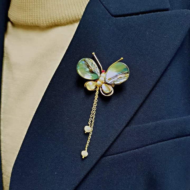 Broche de borla con forma de mariposa y concha para mujer