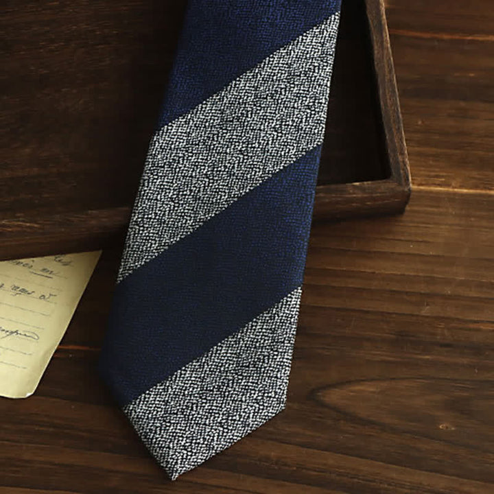 Corbata de rayas en bloque azul marino y gris para hombre
