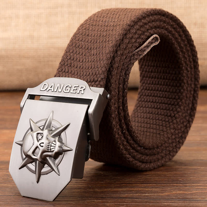 Cinturón de lona tejida con hebilla automática de calavera para hombre