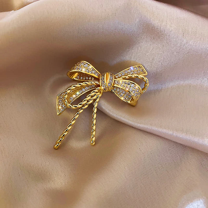 Broche de circonitas con lazo para mujer