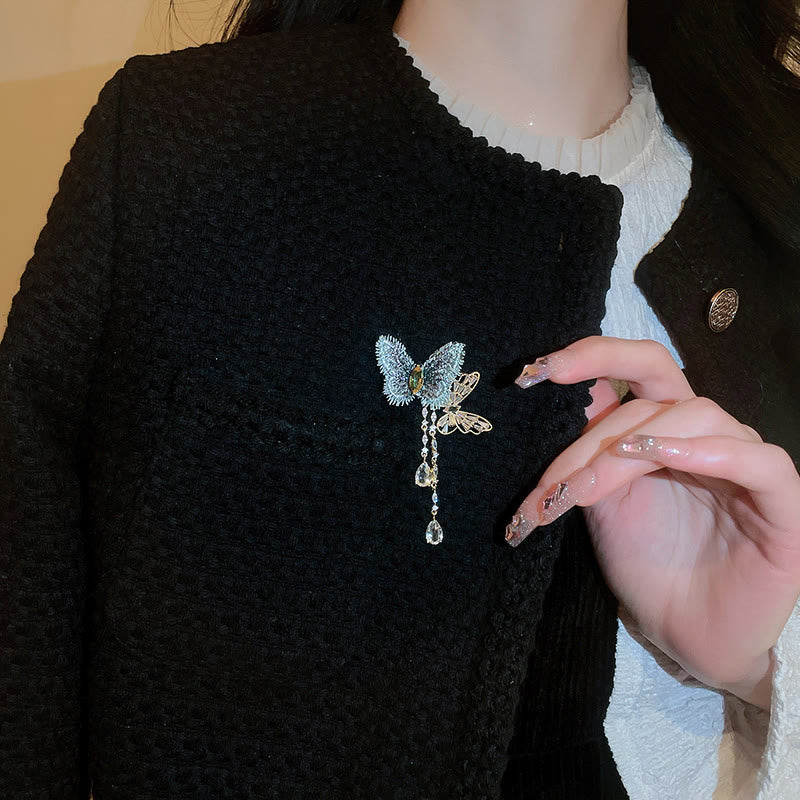 Broche elegante con borlas de mariposa azul para mujer