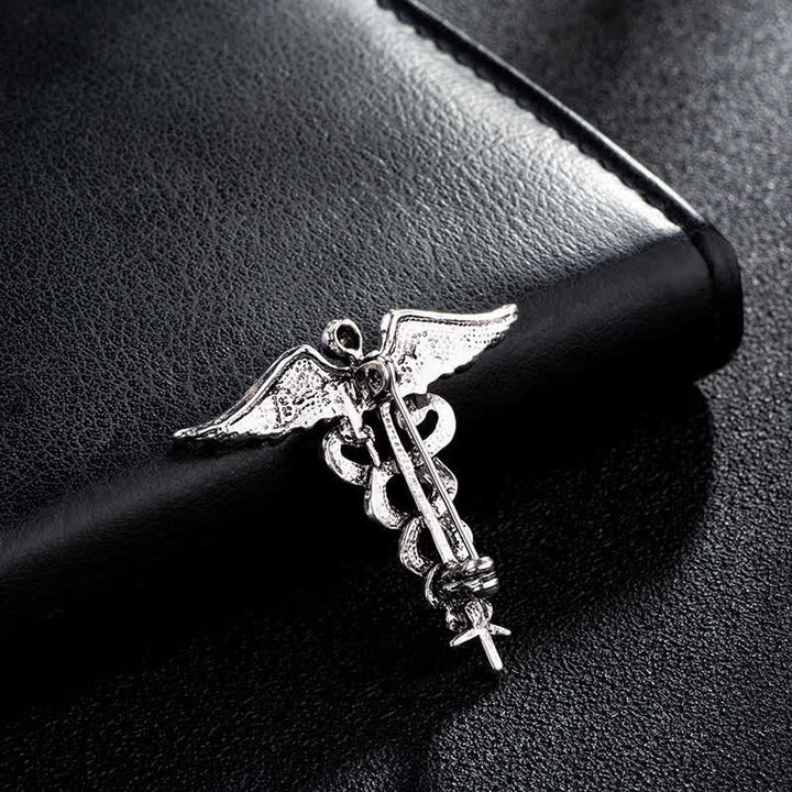 Broche de serpiente doble con caduceo para hombre