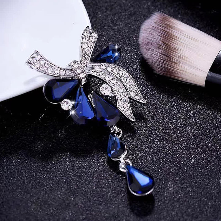 Broche con lazo en forma de lágrima para mujer