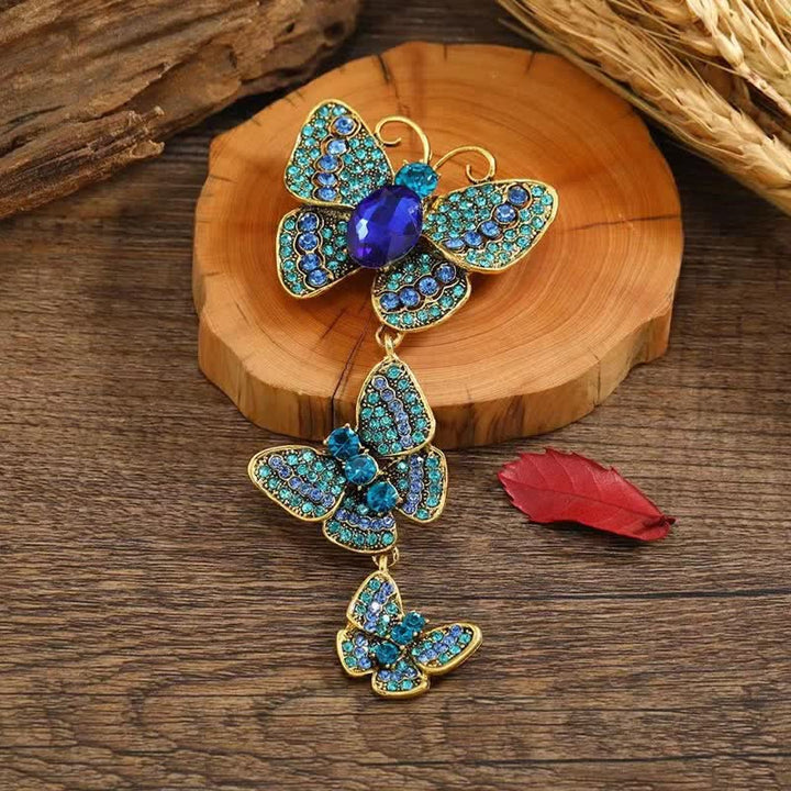 Broche de mariposas triples y divertido para mujer