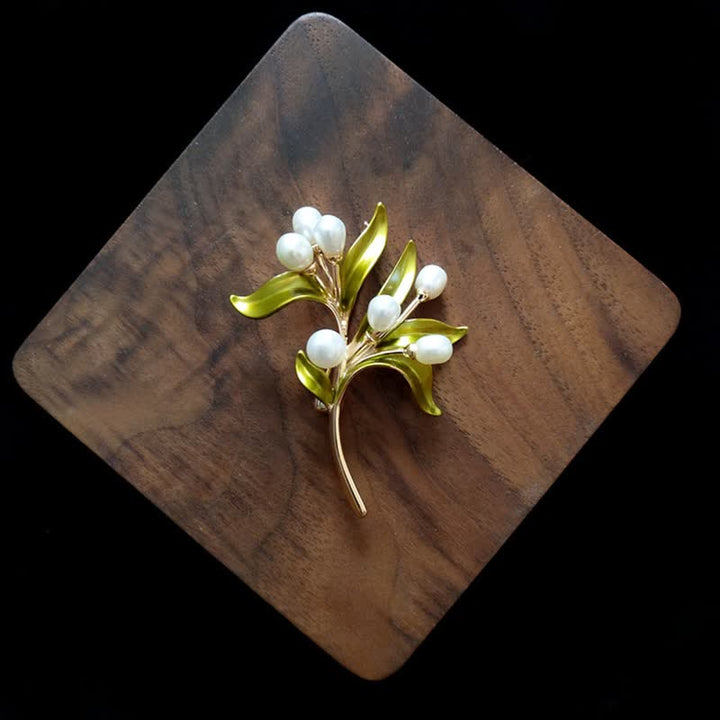 Broche de rama de olivo con perla natural para mujer