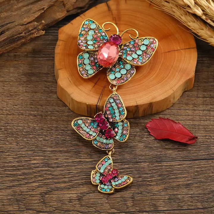 Broche de mariposas triples y divertido para mujer