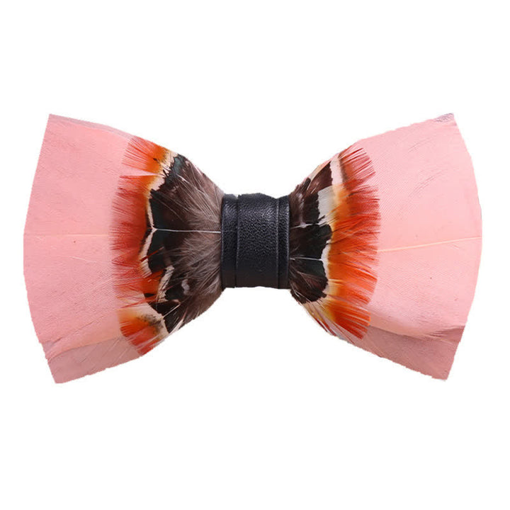 Pajarita con plumas rosas pop y broche de solapa