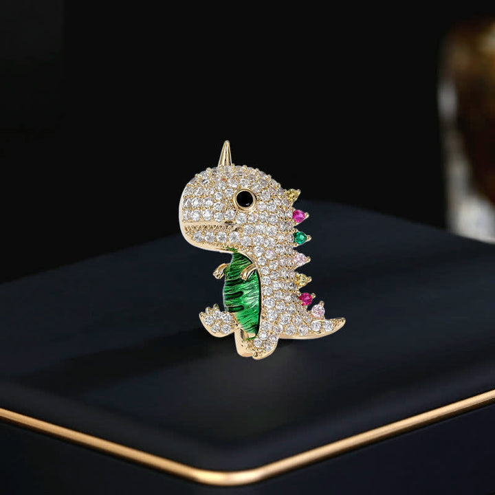 Broche de dinosaurio brillante con dibujos animados para mujer