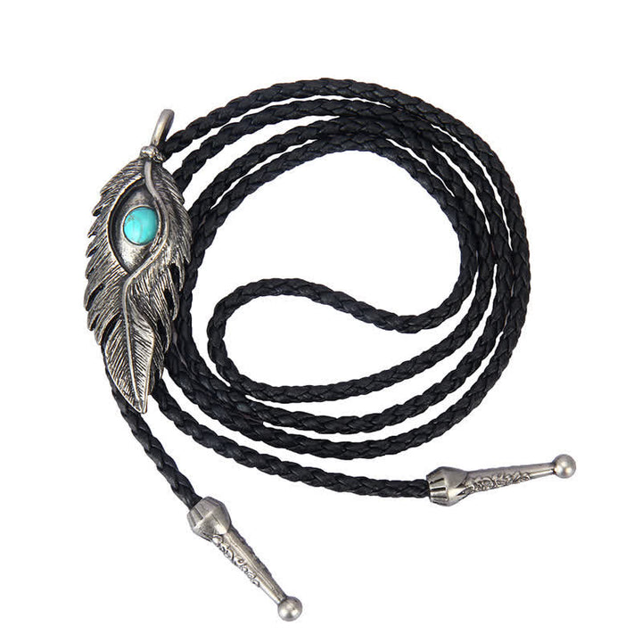 Corbata de bolo con forma de pluma e incrustaciones de piedra turquesa azul