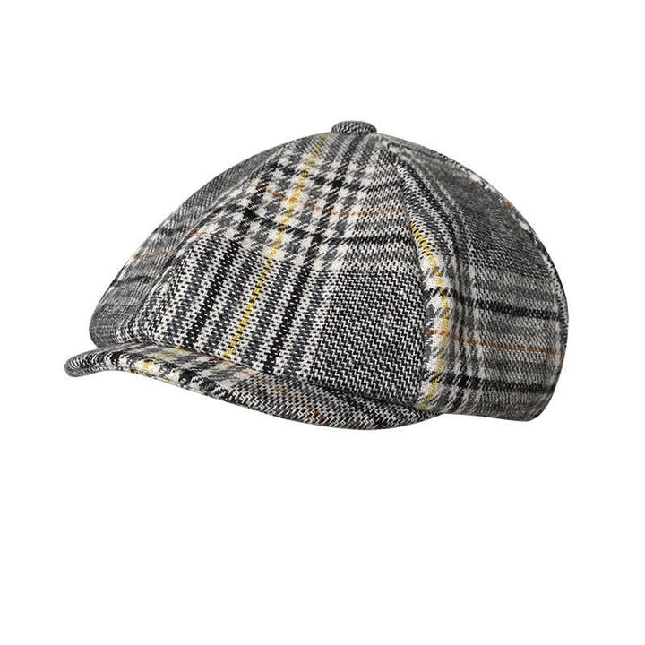 Gorra tipo boina de repartidor de periódicos con rayas amarillas y cuadros grises
