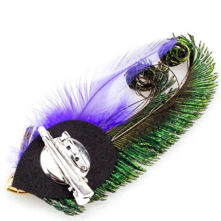 Broche de plumas de pavo real con diamantes de imitación
