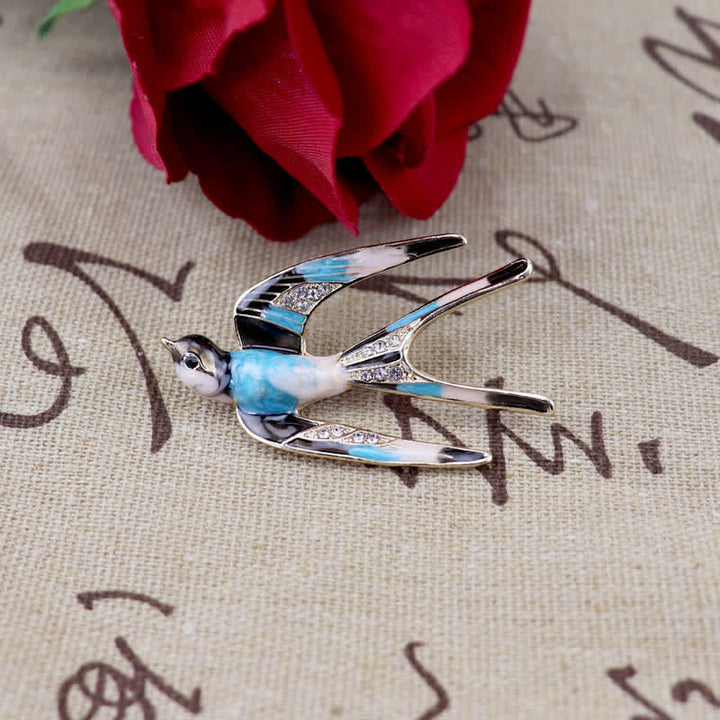 Broche de golondrina esmaltado para mujer