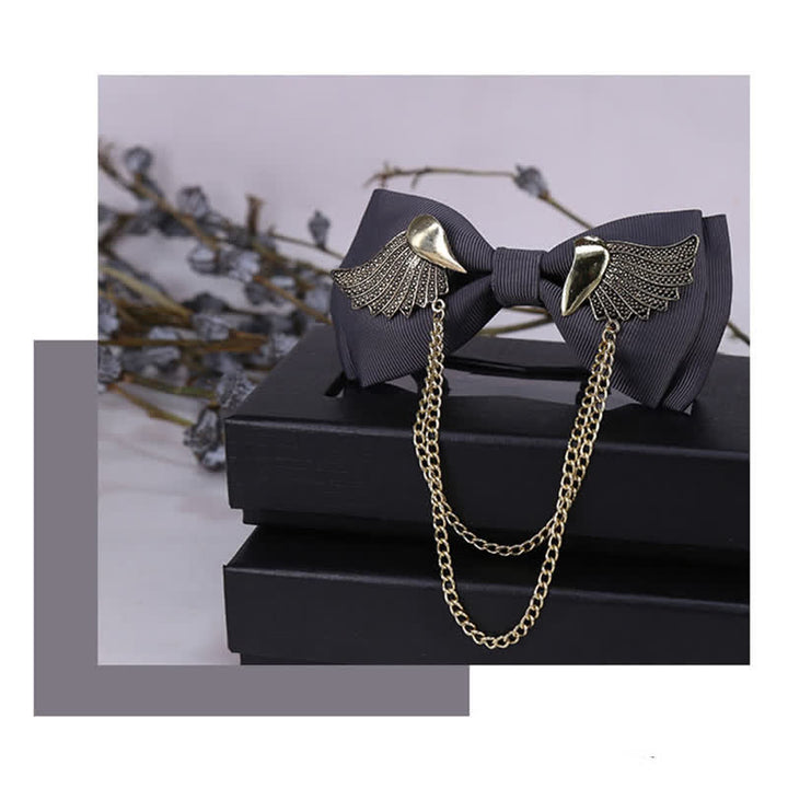 Pajarita con cadena y alas doradas para hombre
