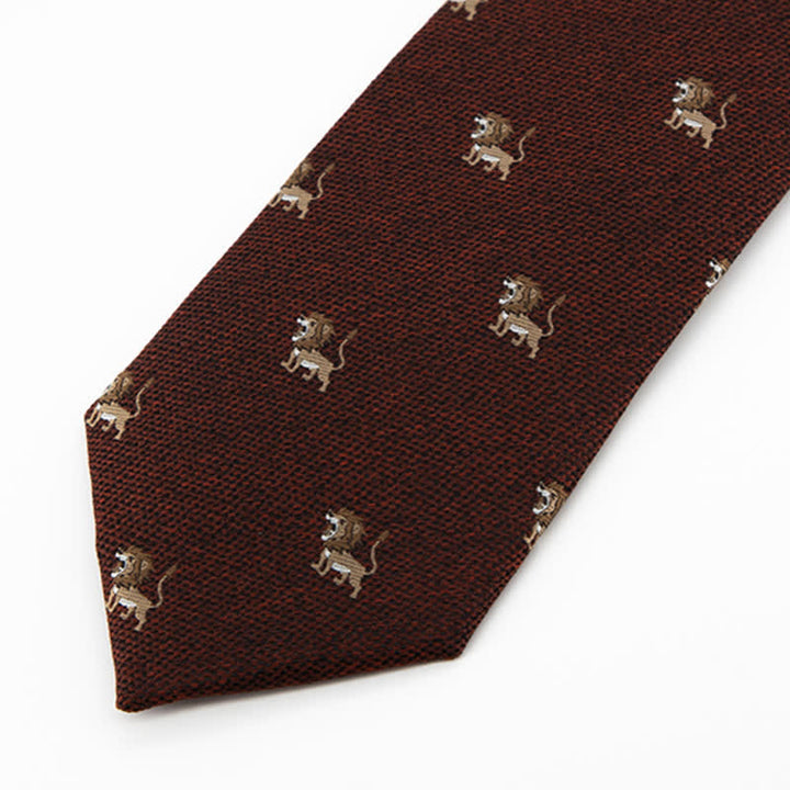 Corbata de hombre con dibujo de león y cazador de animales