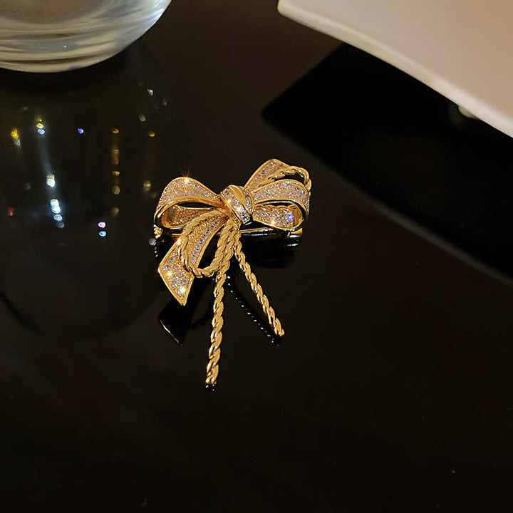 Broche de circonitas con lazo para mujer