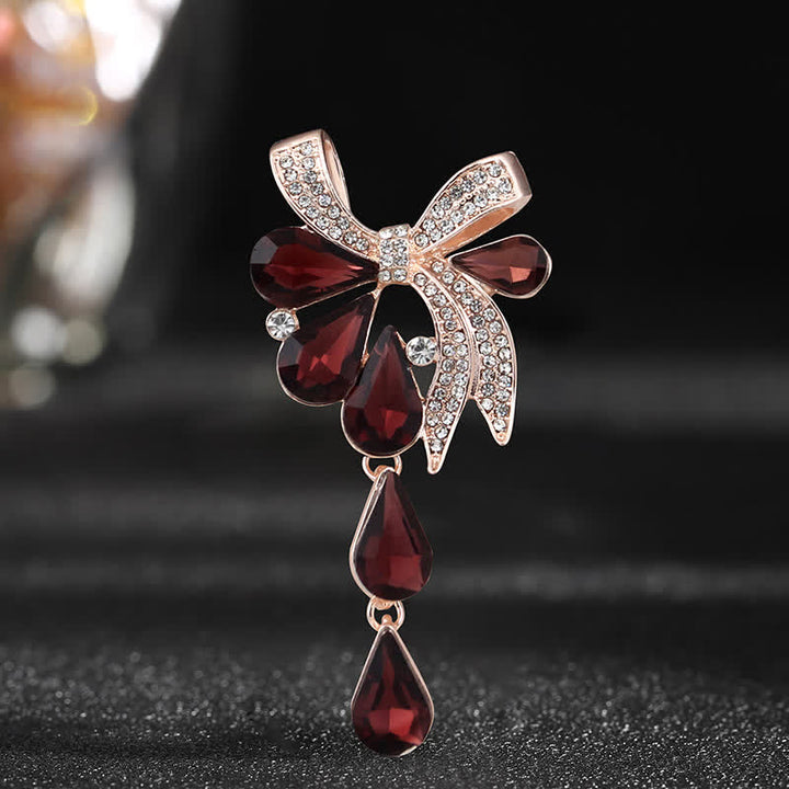 Broche con lazo en forma de lágrima para mujer