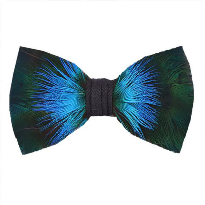 Pajarita infantil con plumas azules y verdes Aurora y broche de solapa