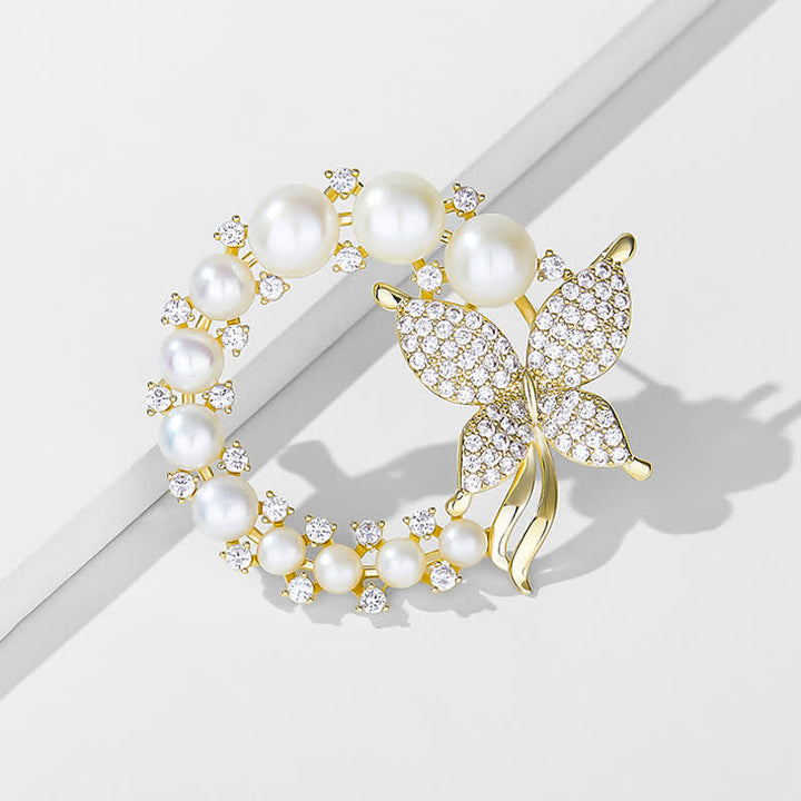 Broche de mariposa dorada con corona de perlas para mujer