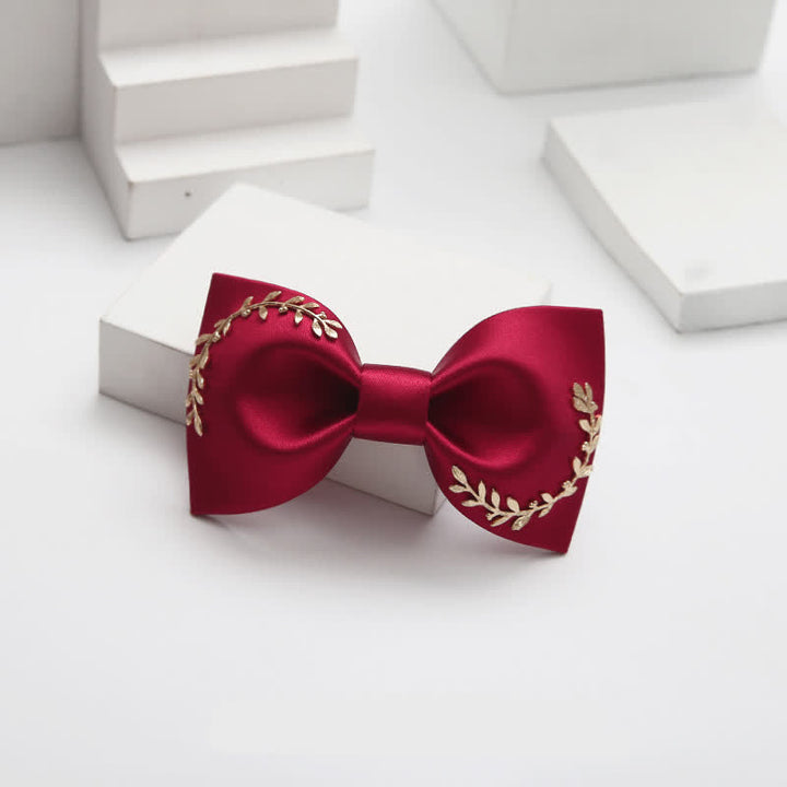 Pajarita de boda con hojas doradas para hombre