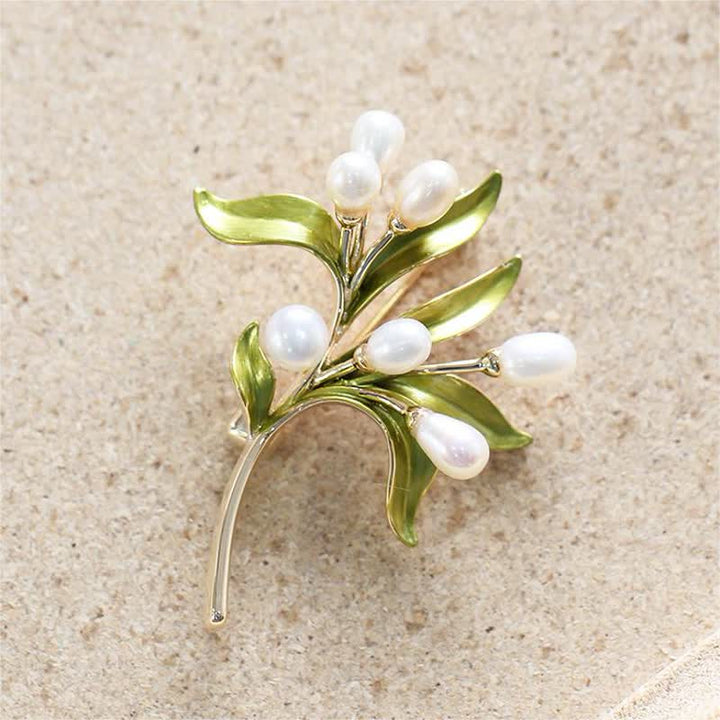 Broche de rama de olivo con perla natural para mujer