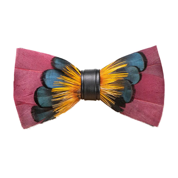 Pajarita con plumas simétricas en color rosa y naranja y broche de solapa