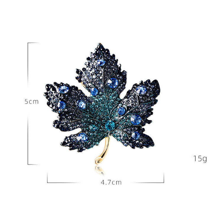 Broche de hoja de arce con cristales de imitación para mujer