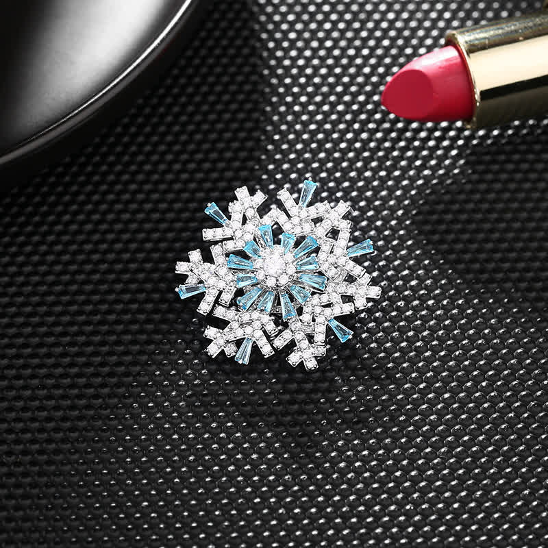 Broche de copo de nieve giratorio para mujer