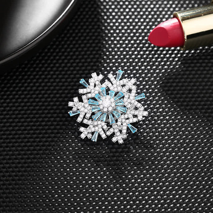 Broche de copo de nieve giratorio para mujer