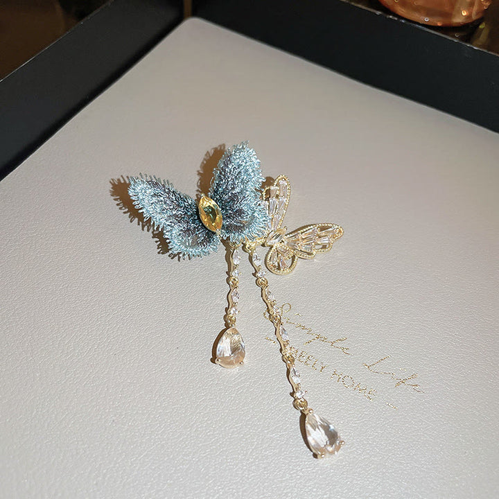 Broche elegante con borlas de mariposa azul para mujer