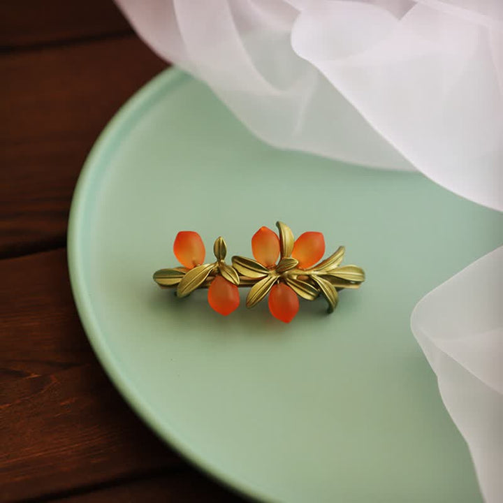Broche pastoral de naranja y bayas para mujer