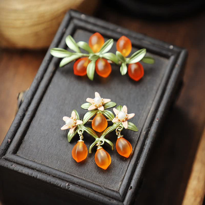 Broche pastoral de naranja y bayas para mujer