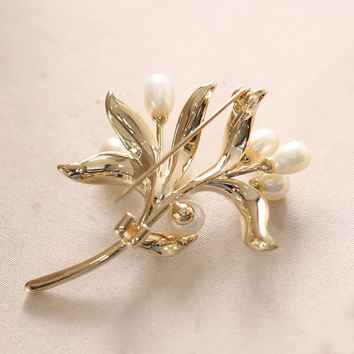 Broche de rama de olivo con perla natural para mujer