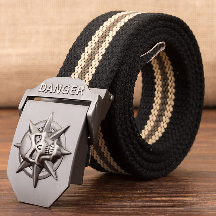 Cinturón de lona tejida con hebilla automática de calavera para hombre