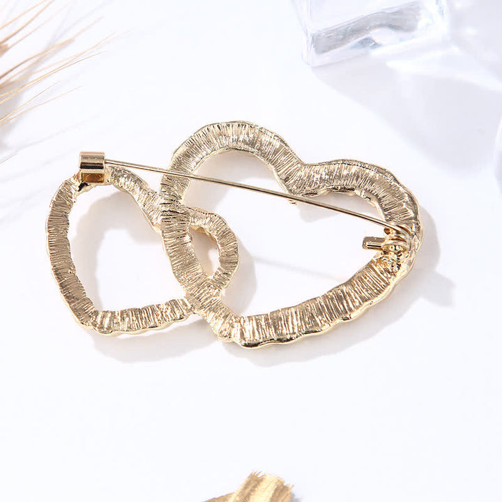 Broche de mujer de corazón a corazón con doble amor