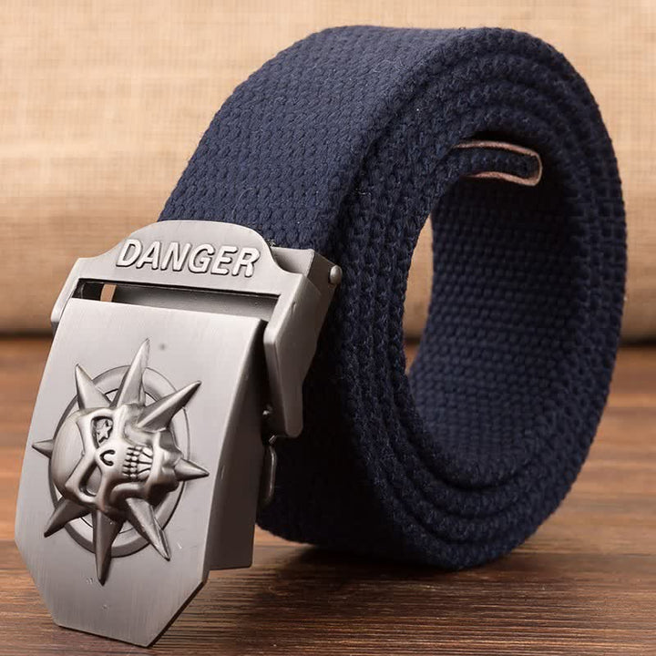 Cinturón de lona tejida con hebilla automática de calavera para hombre