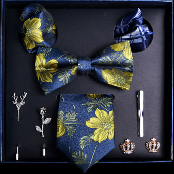 Caja de regalo con 8 pajaritas de moda con hojas de color azul real y amarillo y flores.