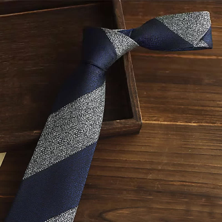 Corbata de rayas en bloque azul marino y gris para hombre