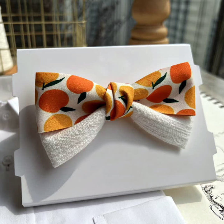 Pajarita con frutas tropicales de color naranja para hombre