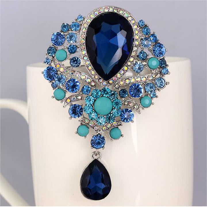 Broche de cristal transparente con forma de flor y gota de agua para mujer.