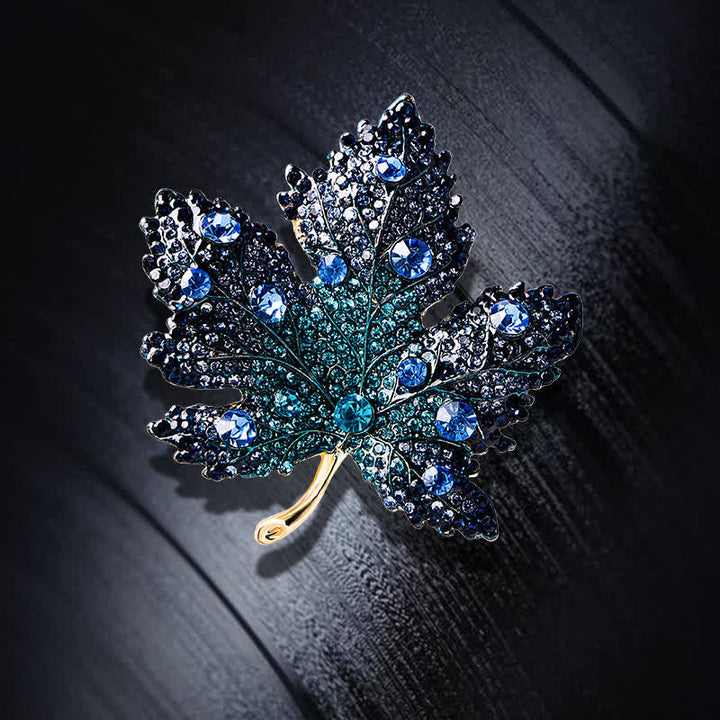 Broche de hoja de arce con cristales de imitación para mujer