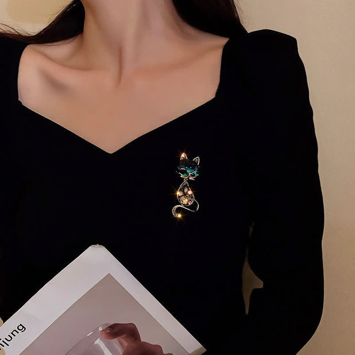 Broche de zorro con ojos verde azulado para mujer
