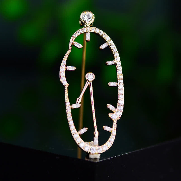 Broche unisex con reloj abstracto con hora invertida