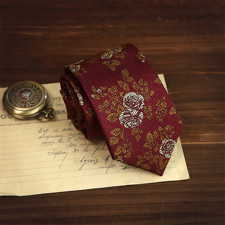 Corbata de hombre con estampado floral en blanco y dorado y cuadros burdeos 