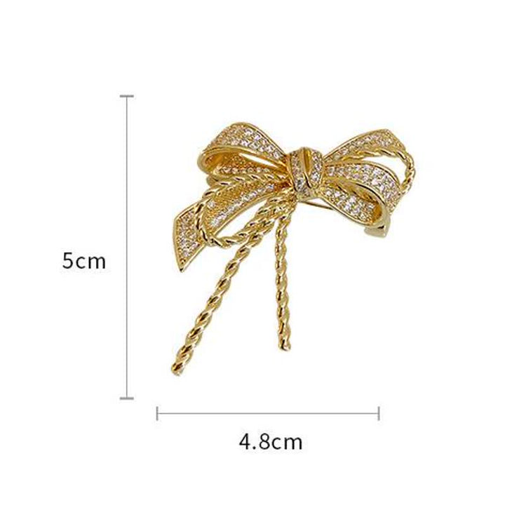 Broche de circonitas con lazo para mujer