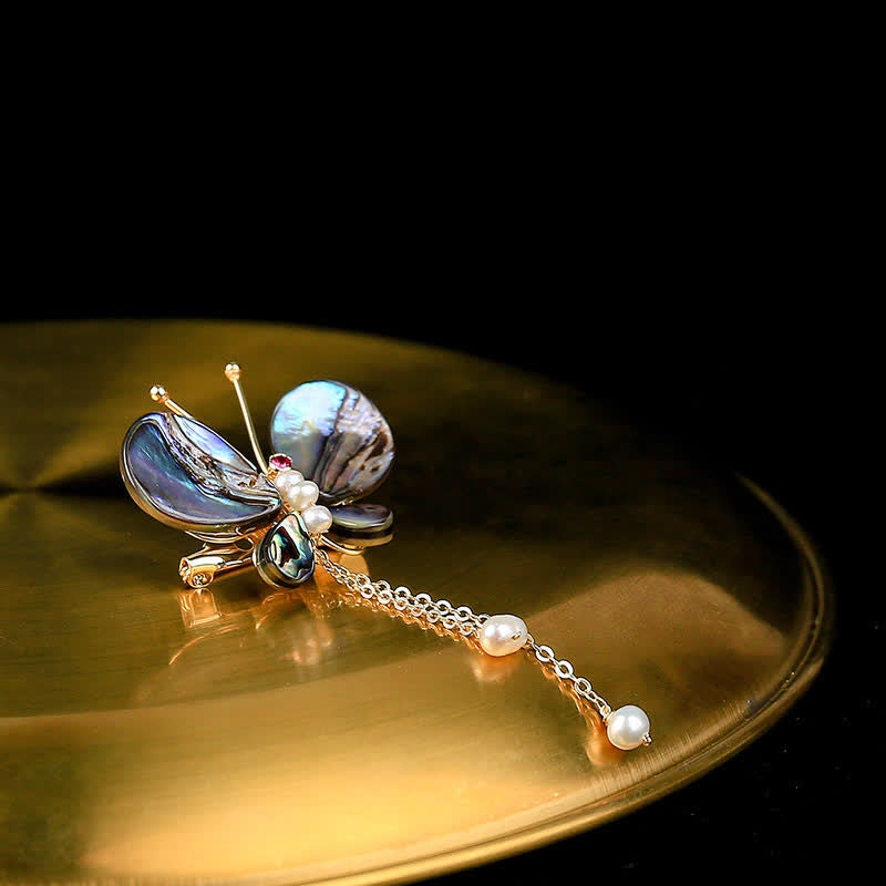Broche de borla con forma de mariposa y concha para mujer