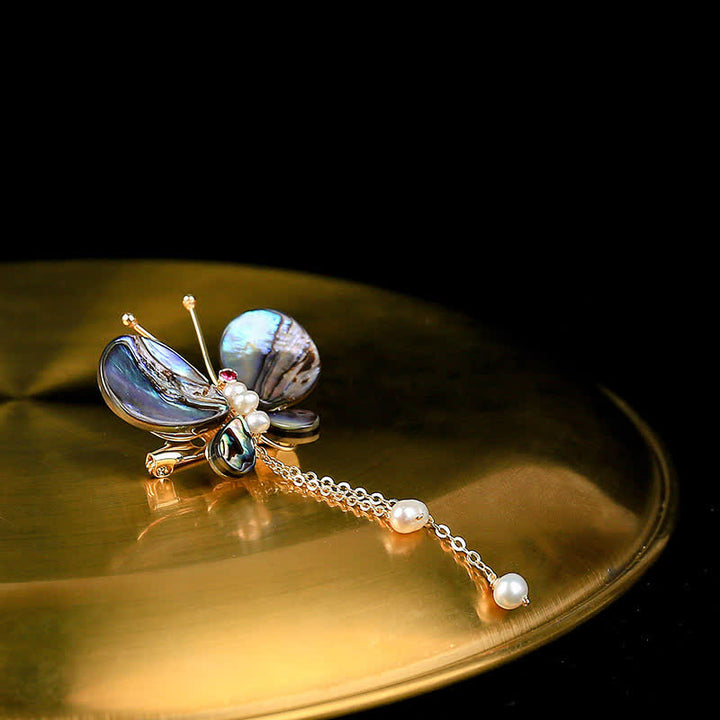 Broche de borla con forma de mariposa y concha para mujer